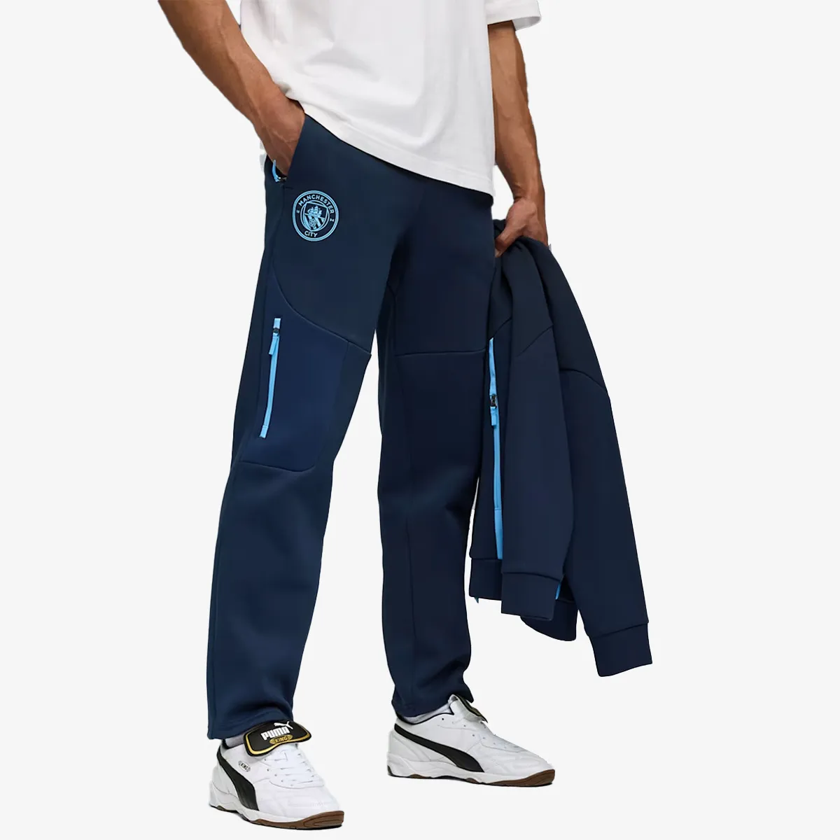 PUMA Hlače MCFC PUMATECH Sweatpants Deep Navy-Team 
