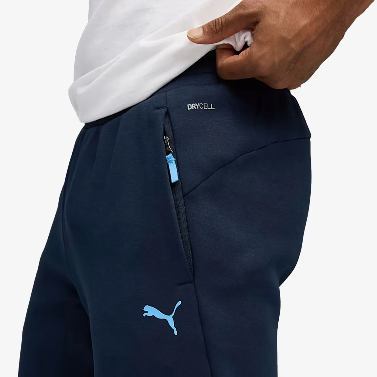 PUMA Hlače MCFC PUMATECH Sweatpants Deep Navy-Team 