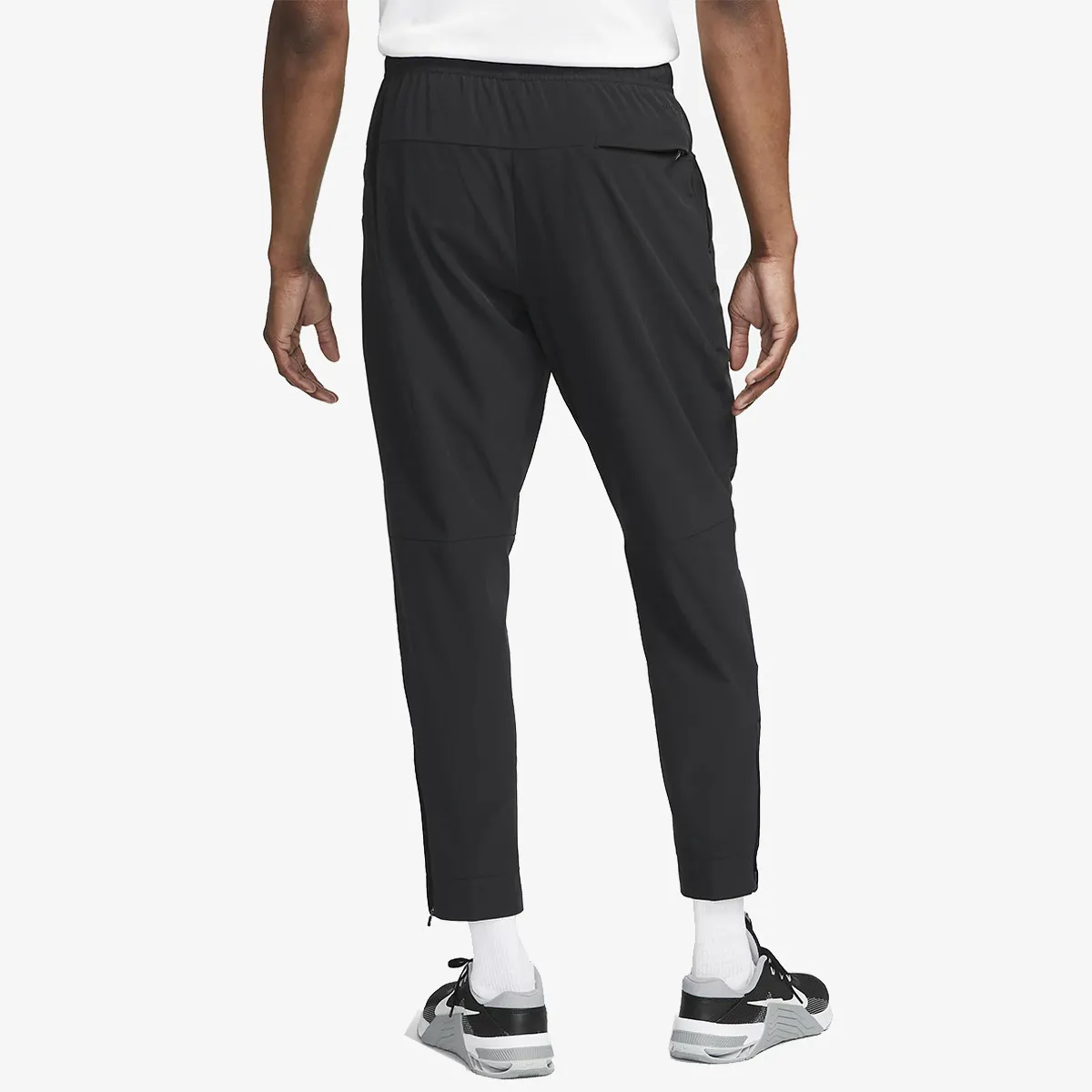 NIKE Hlače M NK DF UNLIMITED PANT TPR 
