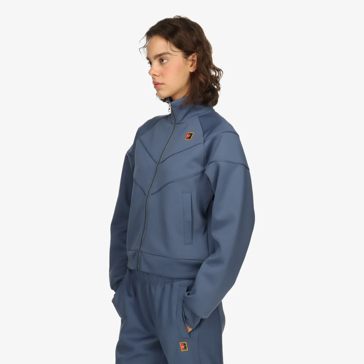NIKE Jakna W NKCT WR POLY KNIT JKT HRTGE 